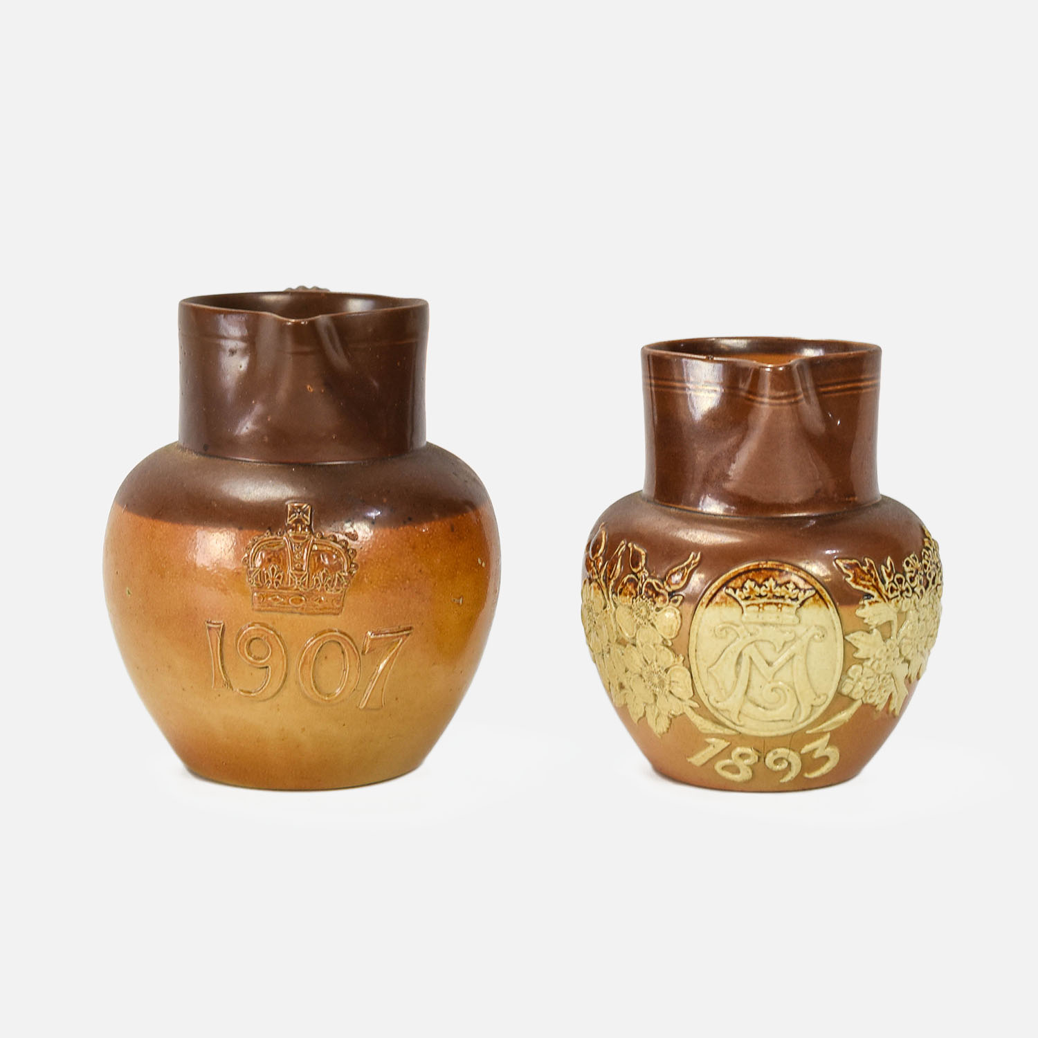 Two Commemorative 1893/1907 Doulton Stoneware Pitchers
