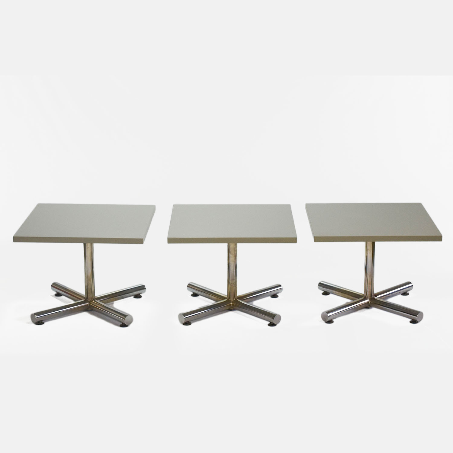 Three Matched 1970s Retro Tubular Chrome and Laminant Square Tables